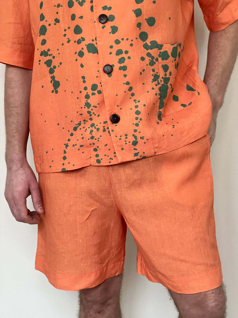 Orange linen shorts for him. Gretes linen collection.